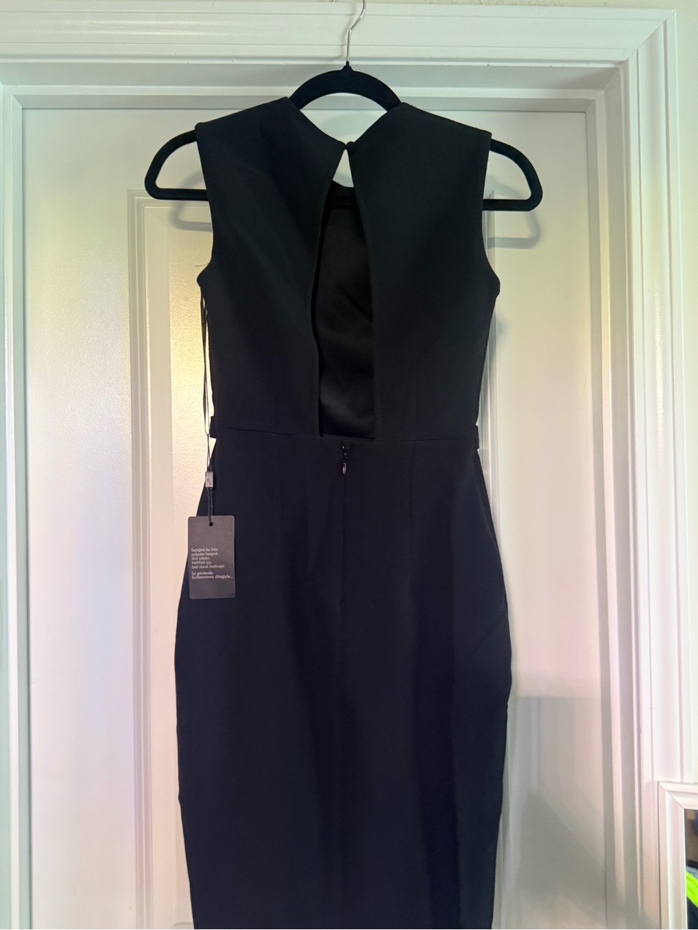 Classic Black Sleeveless Sheath Dress
